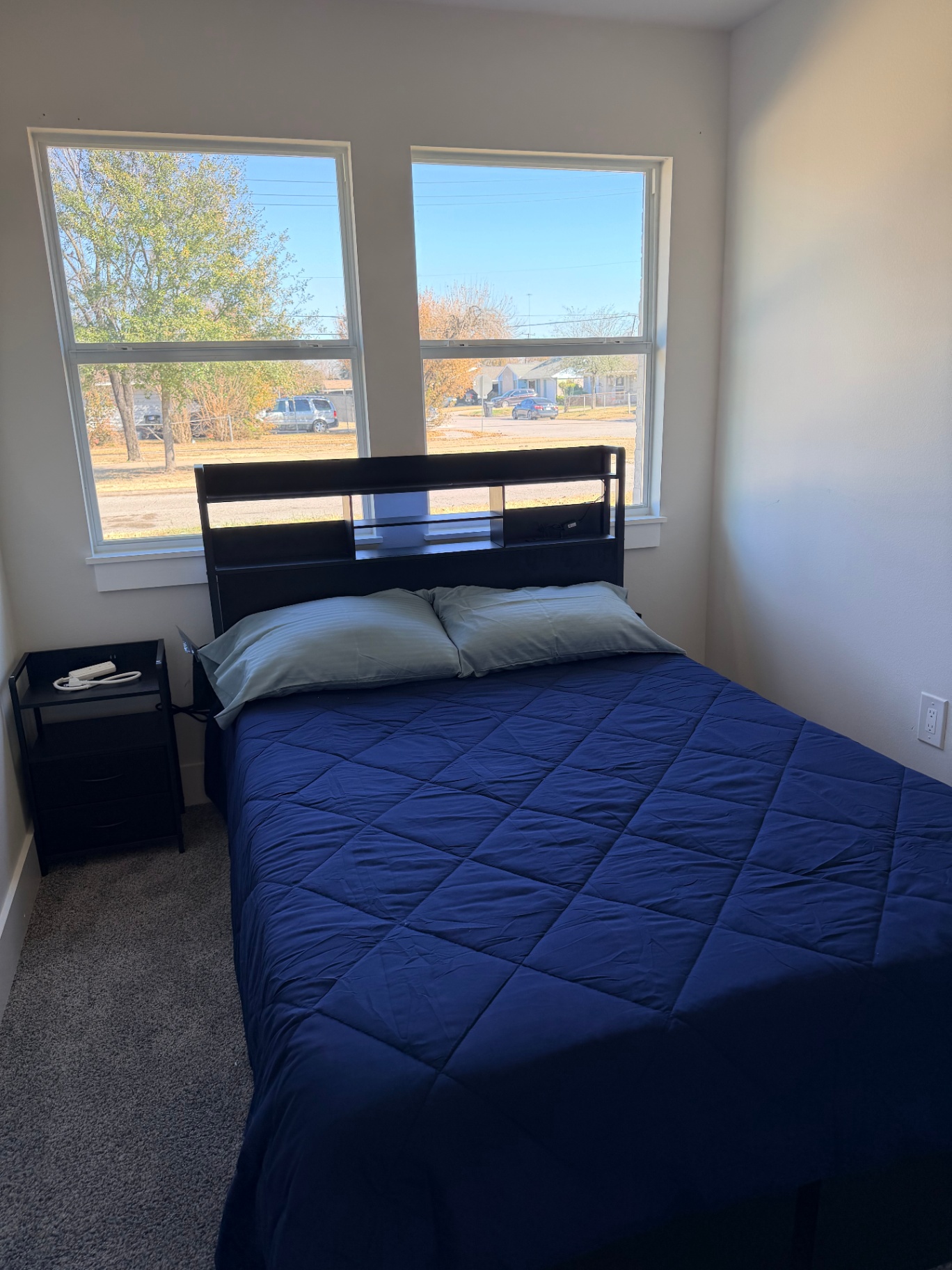 Tilgham House — private bedroom with bedside charging station