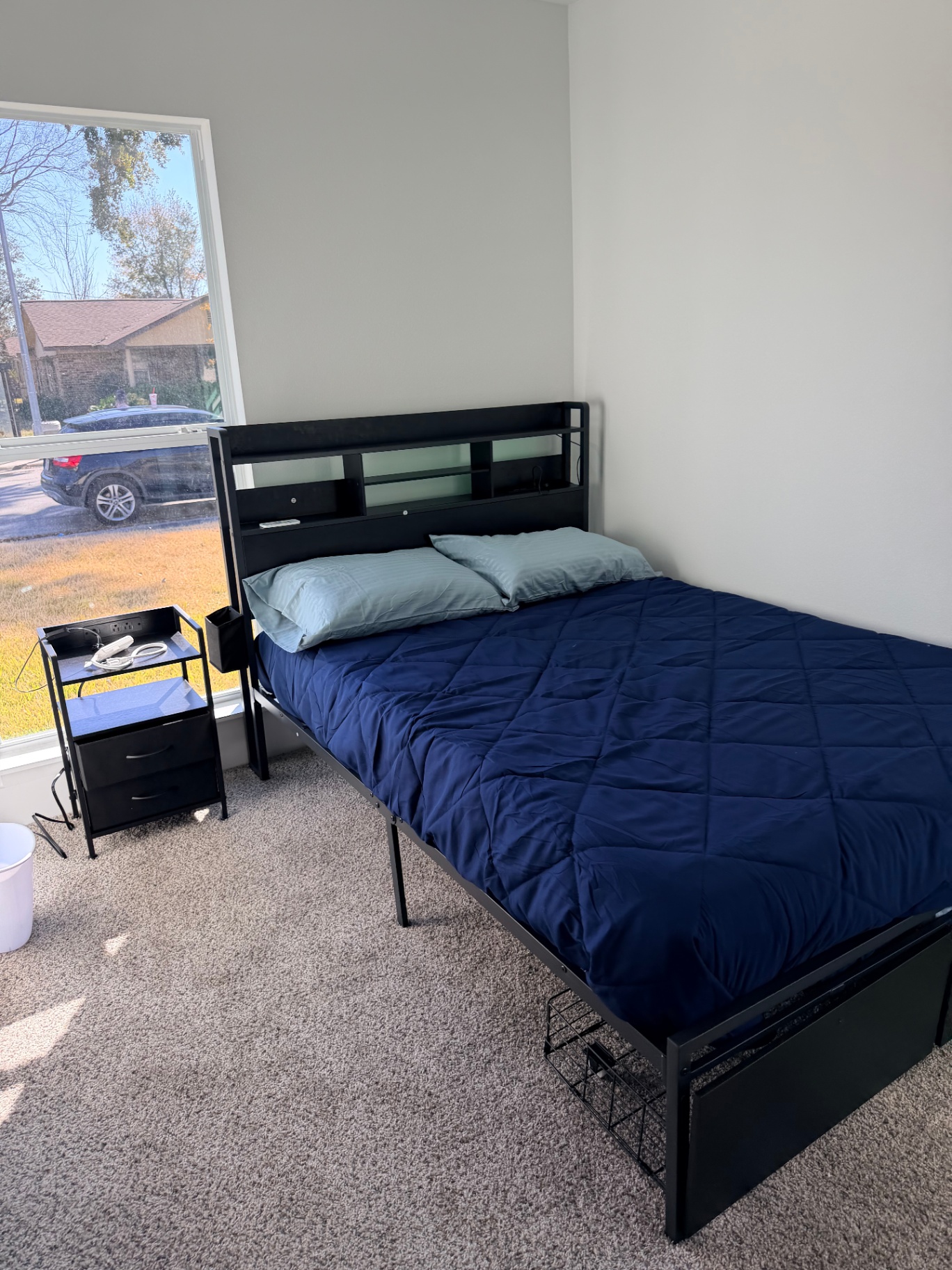Tilgham House — sunny private bedroom with nightstand