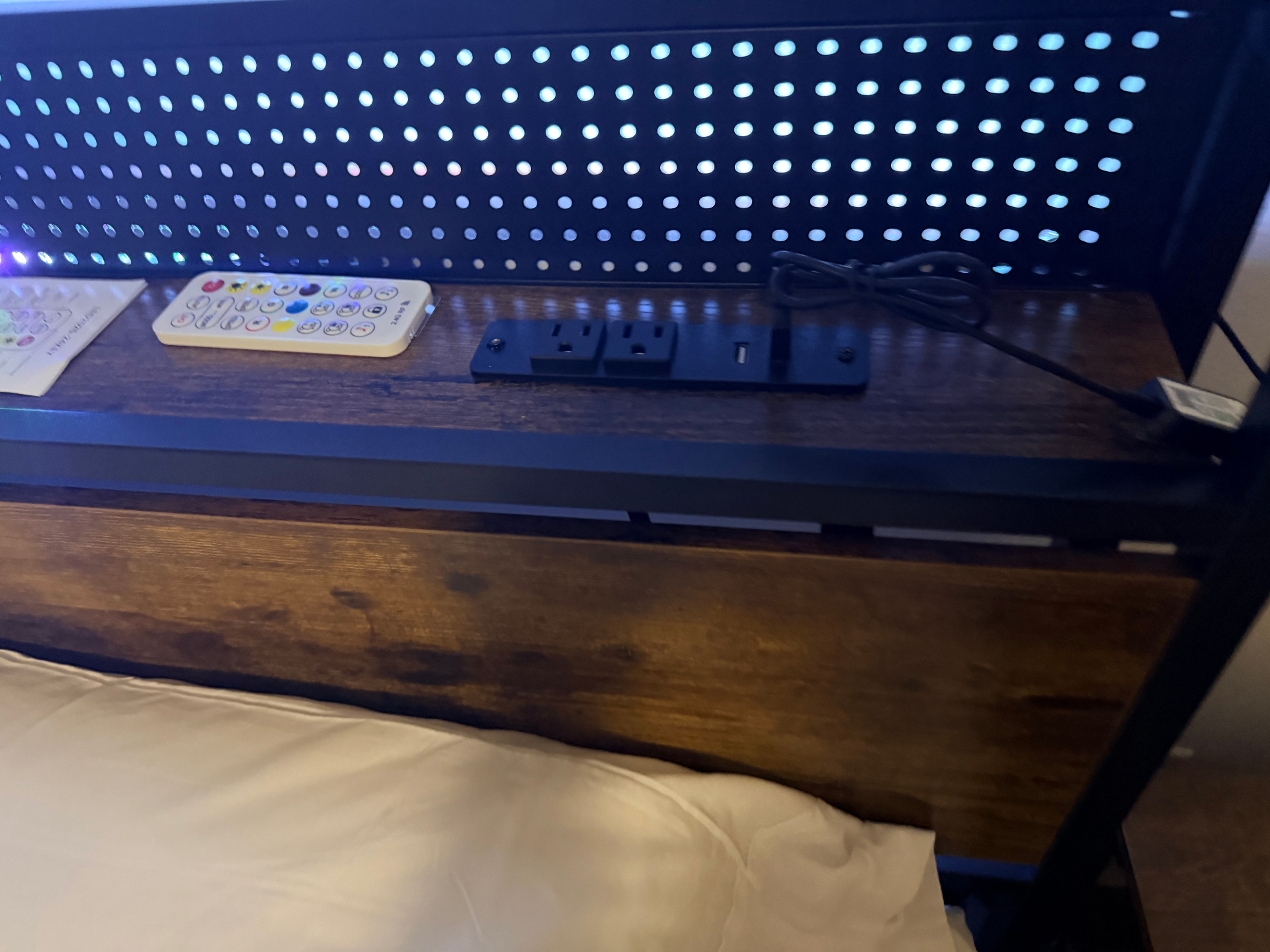 Fairgreen House — bedside outlets and USB charging built into headboard